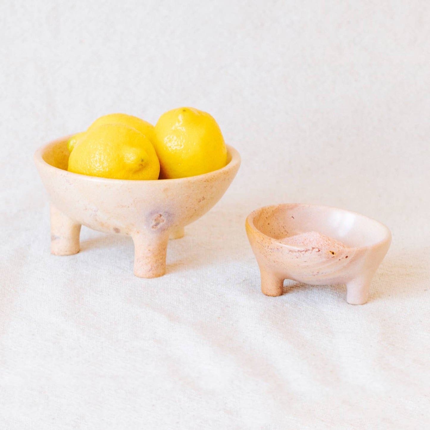 Versatile and visually appealing, this bowl is hand-carved from soapstone in western Kenya. Add them to your table as serving pieces or on your dresser or credenza to hold accessories. Ethically made in Kenya.