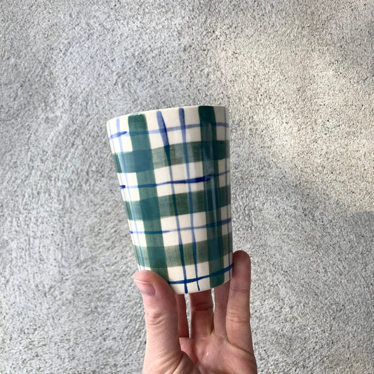 Slip casted ceramic cups in dover white (off white) and painted with a green plaid.