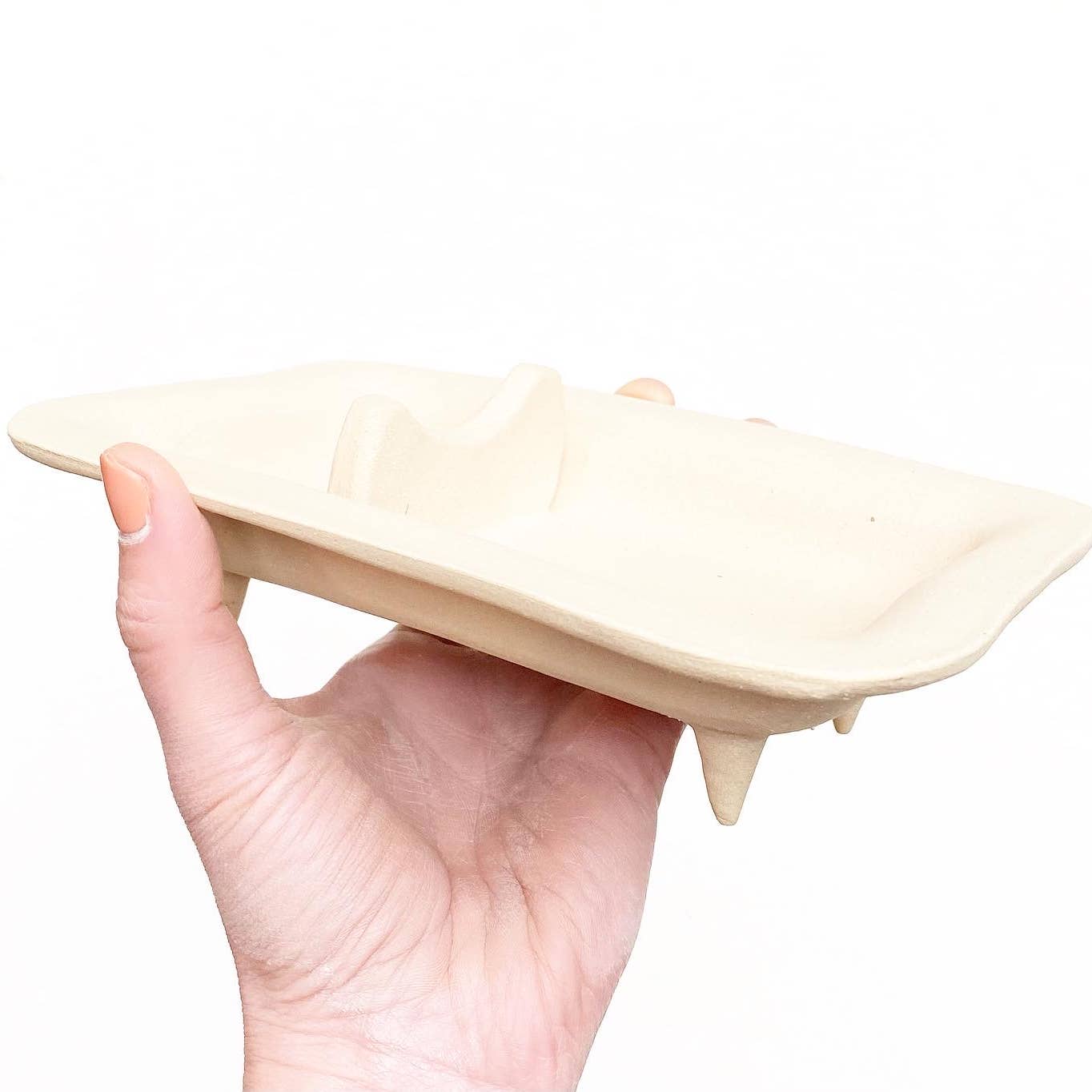 Hand built ceramic dish designed with a rest large enough for a smudge bundle, as well as a place for incense, too. Crafted from buff clay & made in Virginia, USA by Korai Ceramics.