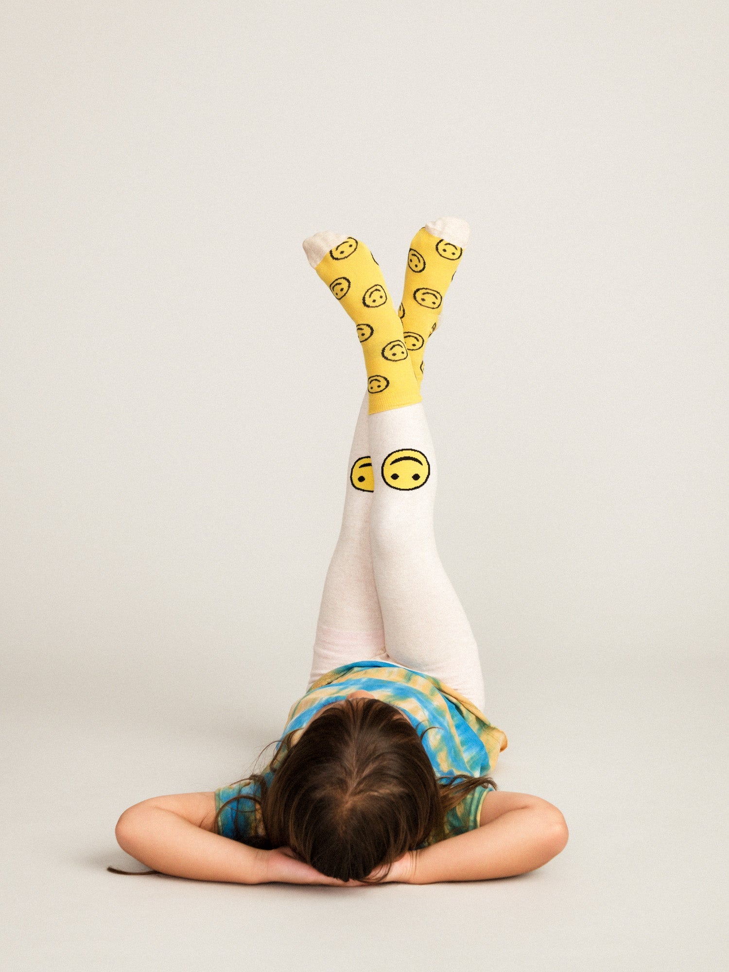 mini emoji legging by hansel from basel / Happiness is… a supercute pair of organic cotton leggings with smiley faces on each knee! Made in Portugal at a family-run factory that operates entirely on renewable energy. organic cotton/polyester/spa<p><spandex