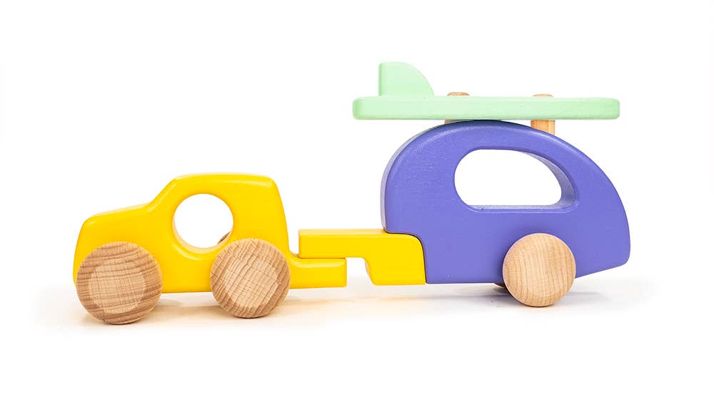This wooden car with camper and surf board push toy is a great way to teach children about movement, speed, forces and will bring on communication skills too through inspiring imaginative play.