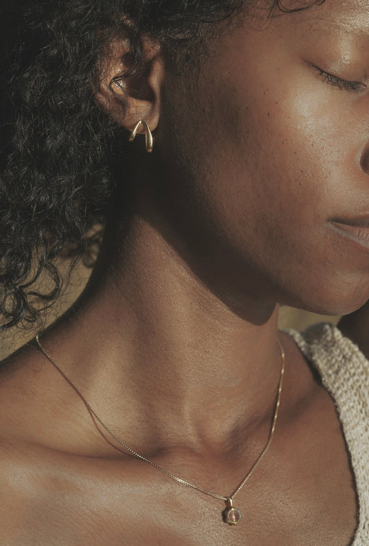 Mountainside Siempre Earrings - Asymmetrical mythical mystical hoop earrings for anytime and anywhere. Inspired by the curvature of a slowly growing vine. Intended to curve around the ear for a unique illusion. Handmade in the Santa Cruz Mountains.