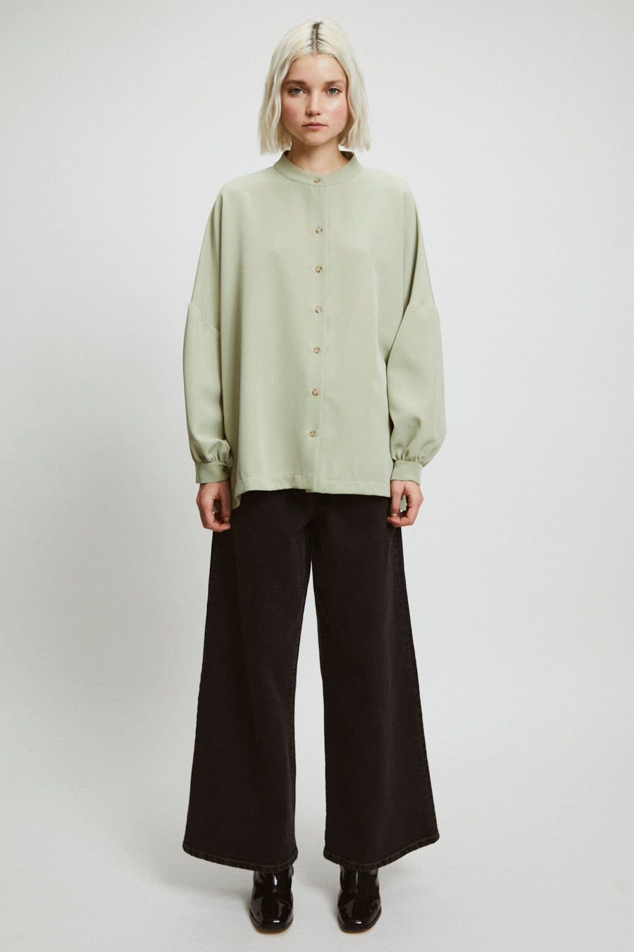 oversize miller top by rita row / A simple button-down, oversize shirt with XXL balloon sleeves & a mock neck. Available in Black or Dirty green. Ethically made in Portugal