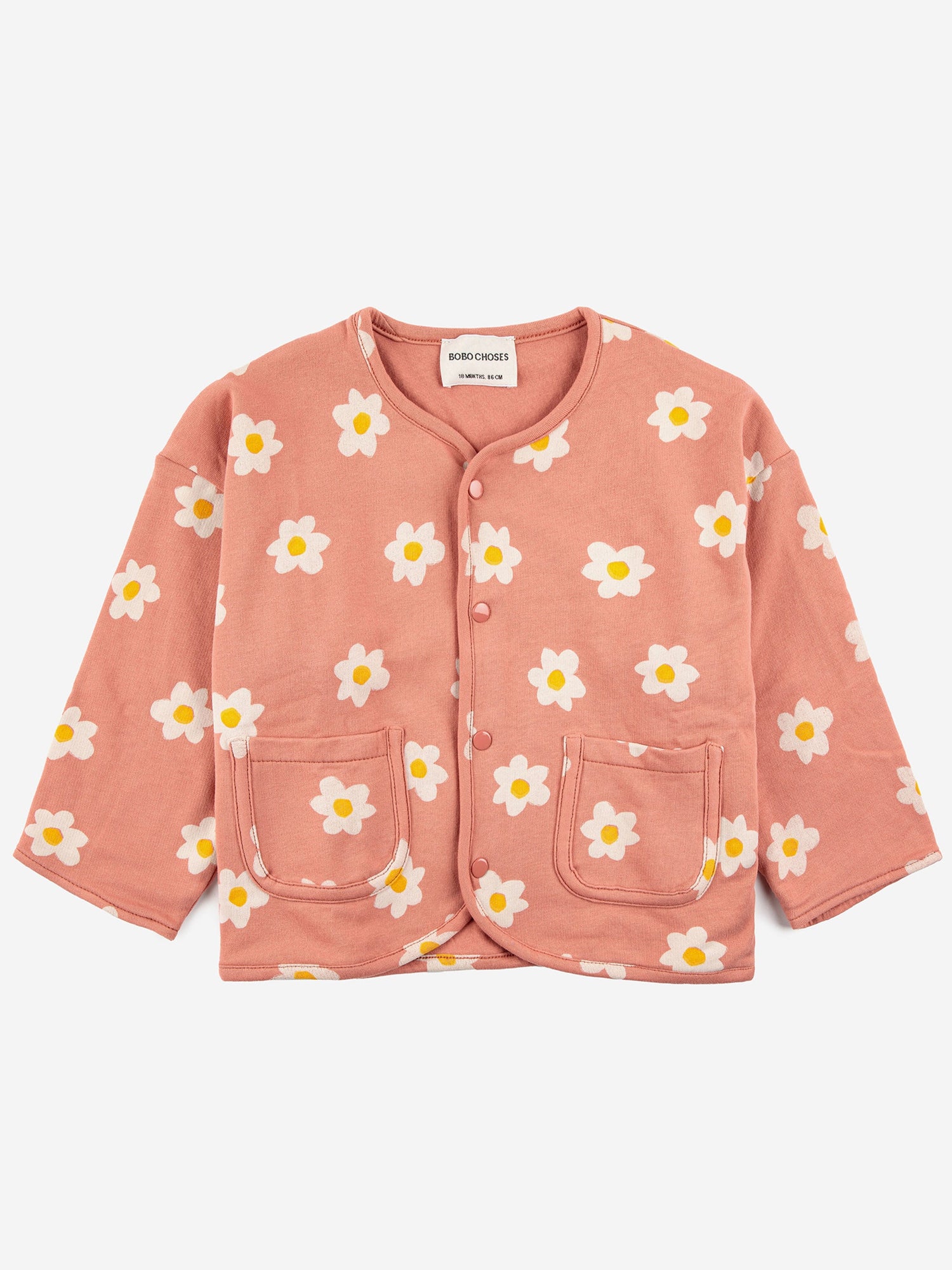 Bobo Choses Baby Little Flower Buttoned Sweatshirt - 95% organic cotton 5% elastane salmon pink with a floral print. Designed as a button down with front pockets. It has a loose fit.  Made ethically and sustainably in Portugal for Bobo Choses.