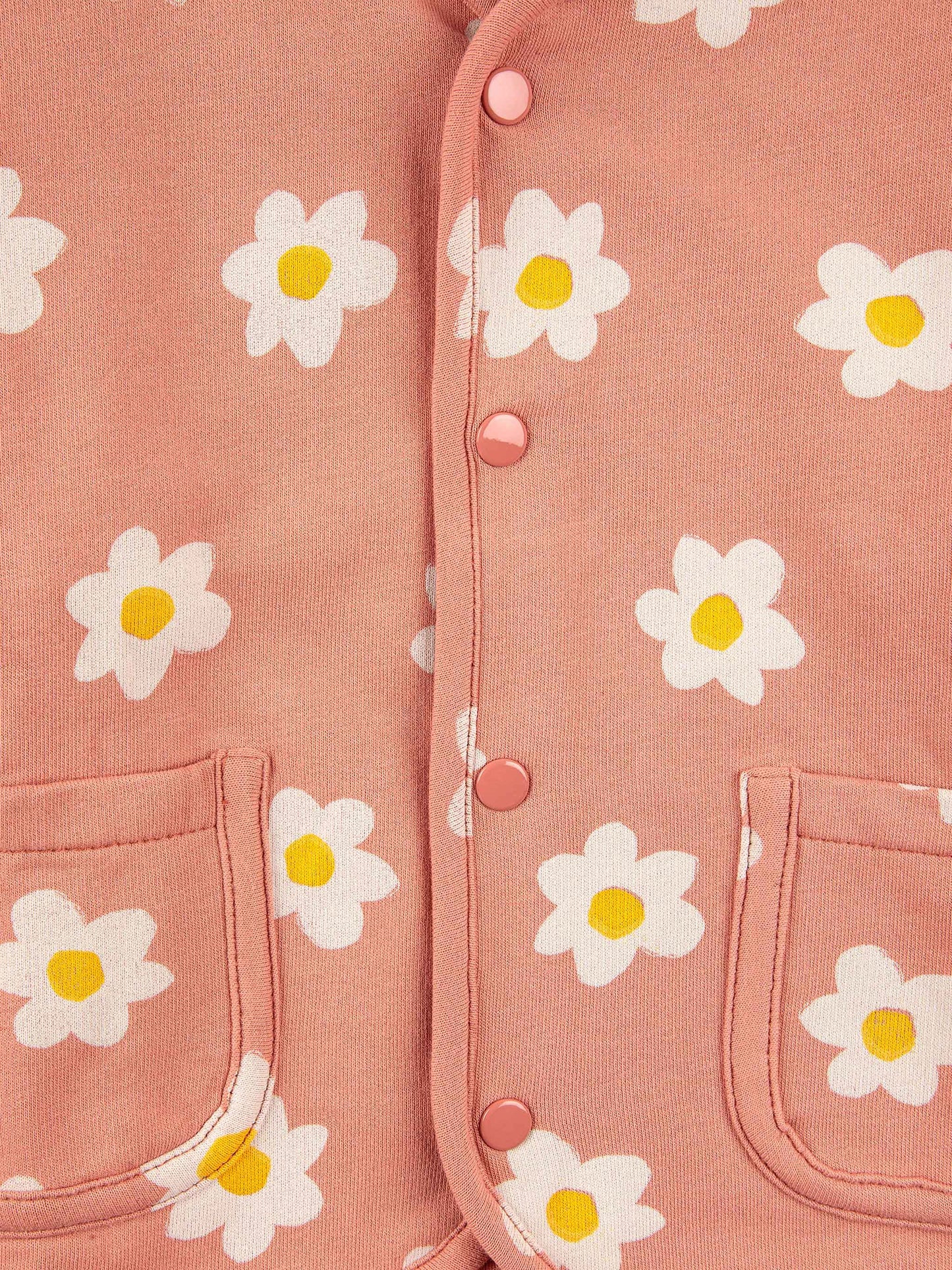 Bobo Choses Baby Little Flower Buttoned Sweatshirt - 95% organic cotton 5% elastane salmon pink with a floral print. Designed as a button down with front pockets. It has a loose fit.  Made ethically and sustainably in Portugal for Bobo Choses.