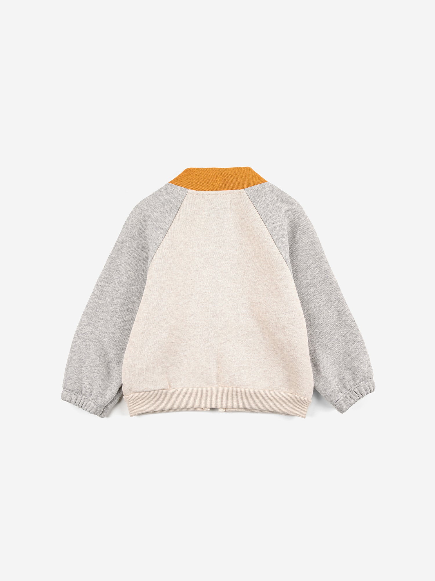 Color Block Sweatshirt by Bobo Choses. 66% cotton 34% organic cotton colorblock zipper sweat shirt. Features an orange collar & green front pockets. Elasticized wristbands & fleece lining makes this super cozy for your little one.  \Made ethically and sustainably in Portugal for Bobo Choses.