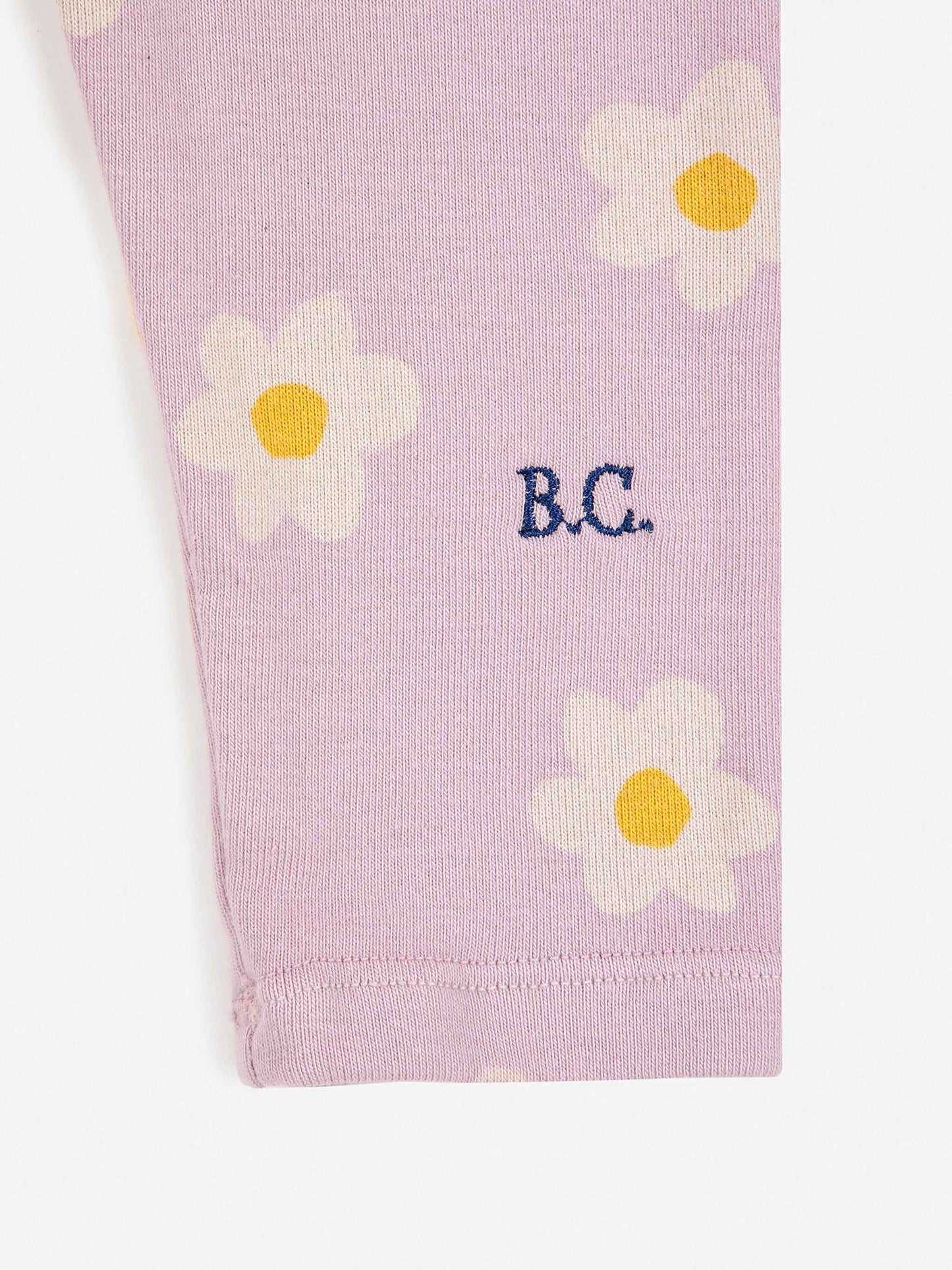 Bobo Choses Baby Little Flower All Over Leggings - 95% organic cotton 5% elastane lavender trousers. Designed with elasticated waistband. It has a slim fit. Made in Spain.
