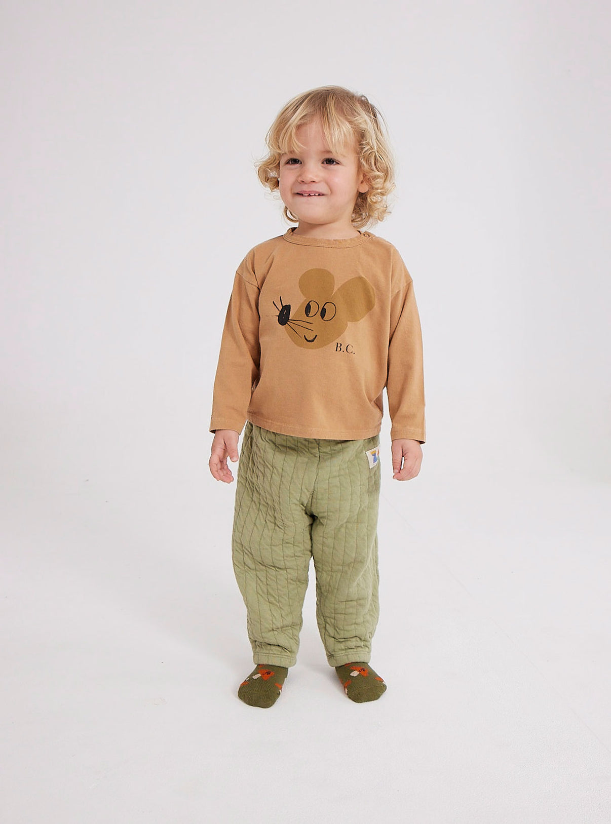 Bobo Choses Baby Quilted Jogging Pants - 78% cotton 22% polyester light green trousers. Designed with elasticated waistband, patch and lightly padded. It has a baggy fit. Made in Portugal.