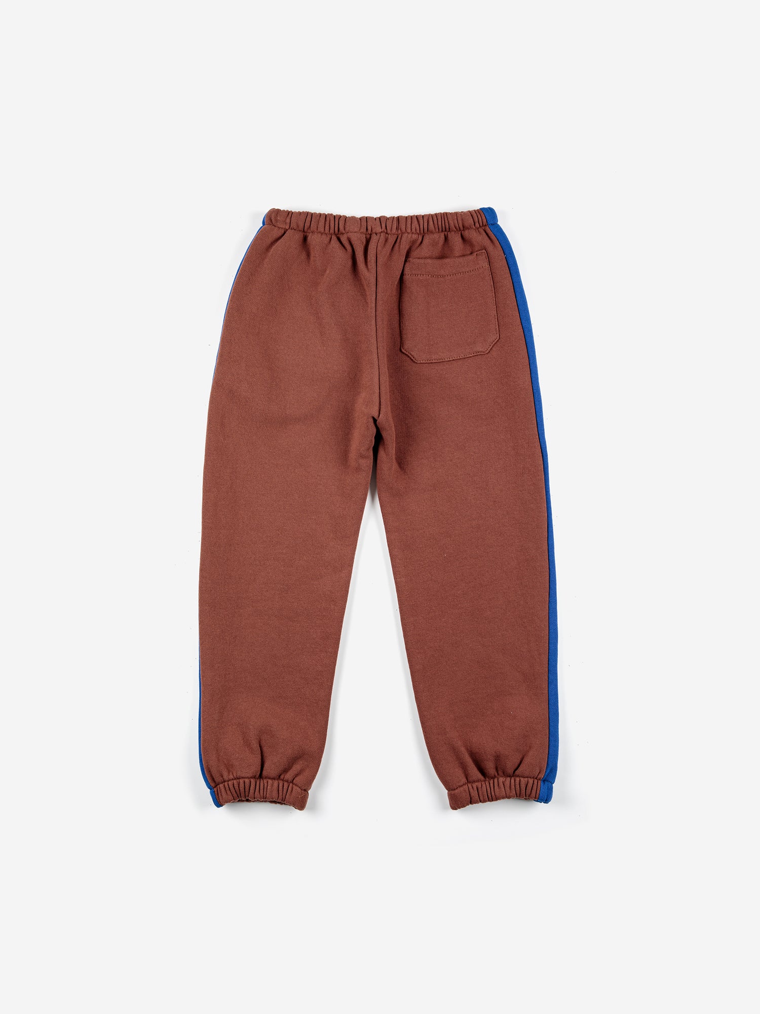 BC Label Jogging Pants by Bobo Choses. 100% organic cotton brown & blue striped joggers. Designed with adjustable waistband, ankle length and fleece lined. It has a baggy fit.   Made ethically and sustainably in Portugal for Bobo Choses.