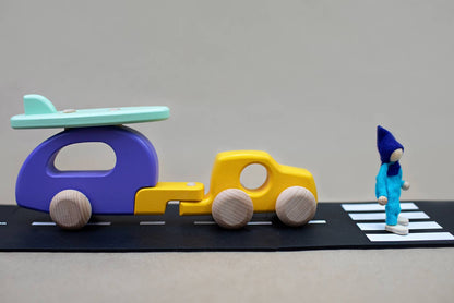 This wooden car with camper and surf board push toy is a great way to teach children about movement, speed, forces and will bring on communication skills too through inspiring imaginative play.