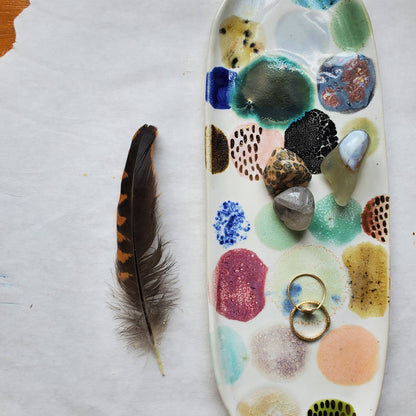 ceramic curious clay / Handmade snack tray featuring colored splotches and gold luster to turn any cocktail or dinner party up a notch. Each tray features one-of-a-kind glaze applications and is completely unique. The perfect host or hostess gift!