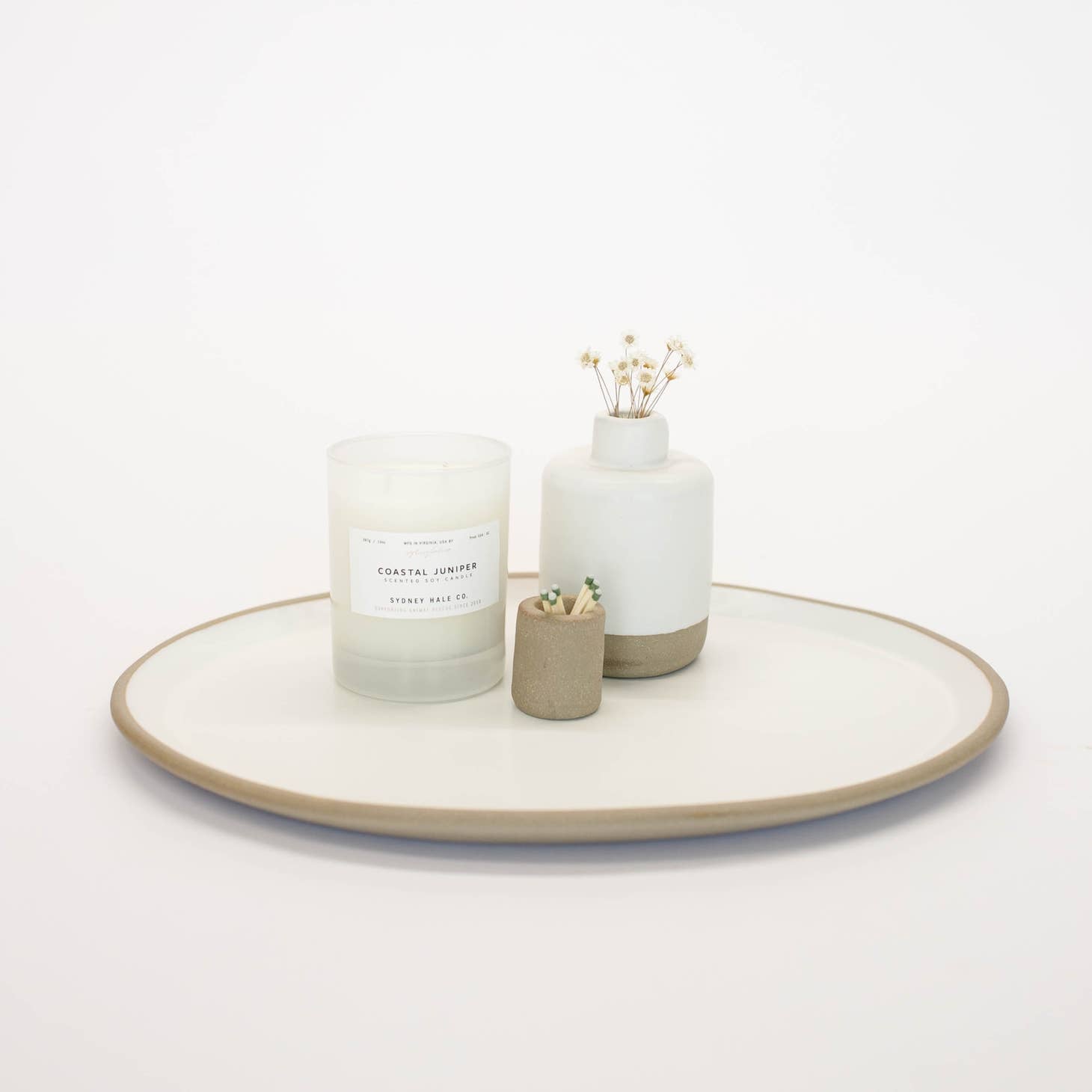 Hand-built with shallow walls, some organic quality around the rim, and a flat base, this ceramic platter is designed for serving. Use it as a charcuterie board, snack platter, coffee table tray, or your main course!  Handmade in Virginia