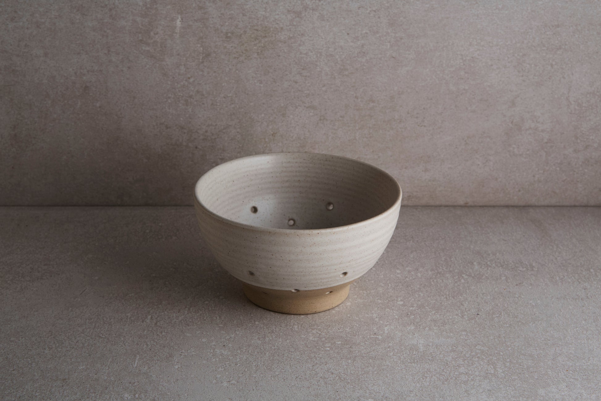 Ceramic colander is great for washing berries and small greens.