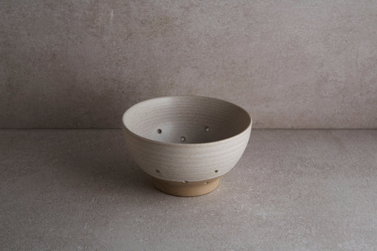 Ceramic colander is great for washing berries and small greens.