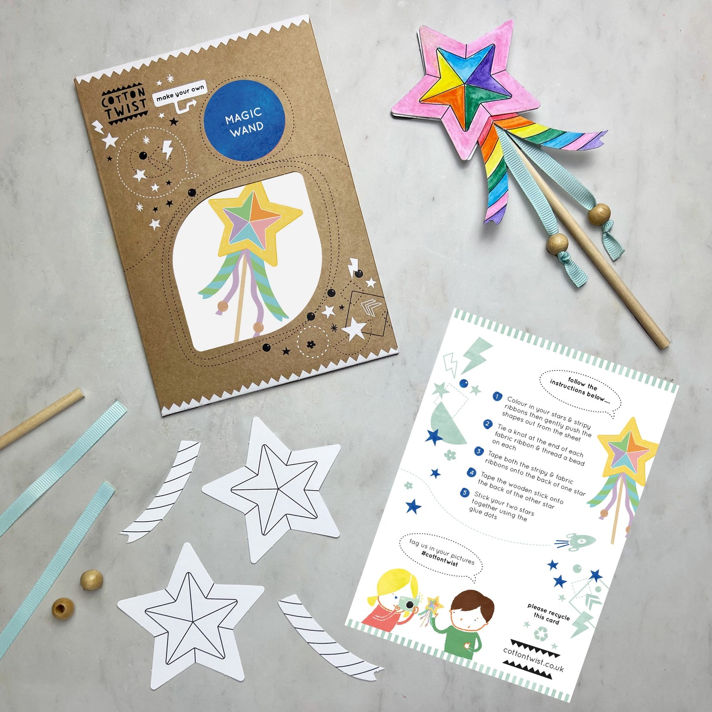 Children can colour the star & ribbon cut outs with their chosen pattern, then it's time to construct their wand. Once the stick & ribbons are taped on, the stars can be stuck together. Beads can be added to the base of the ribbons for additional effect. Time to wave those wands & spread the magic. Each kit is plastic free & lovingly assembled by hand.v