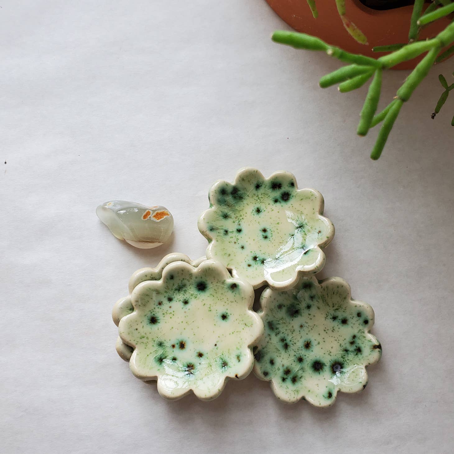 A teeny tiny dish for your rings & other little findings. Some styles feature gold luster accents.  Each one is one of a kind - made with love & enthusiasm by Curious Clay.
