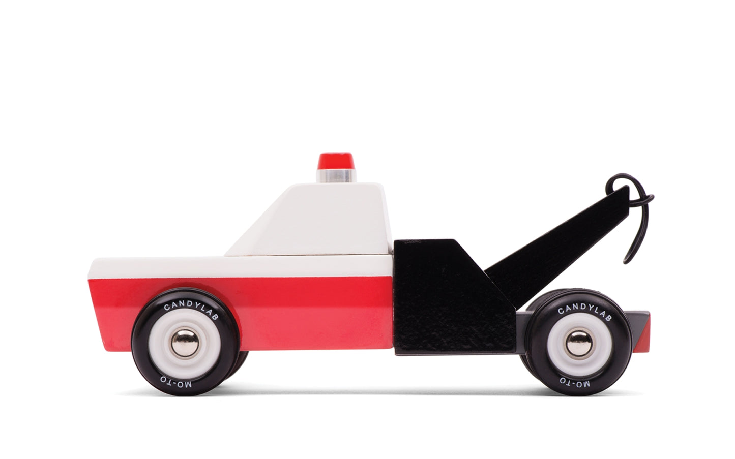 Toy Tow Truck by Candylab Toys features solid beech wood, water-based paints, and ABS plastic wheels. Made sustainably, made to last, made for fun.
