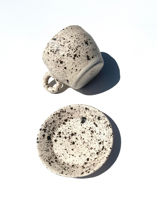 Handmade ceramic espresso cup and matching plate - the perfect set for the coffee lover. Offered in "Dalmatian" spots aka an off-white clay with speckled brownish-black glaze..