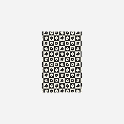slowtide kitchen towel /This lightweight towel quickly dries and easily absorbs moisture. It also features a loop for hanging and is printed with a reactive dye that prevents fading over time. Made from 100% post-consumer waste, primarily plastic bottles.