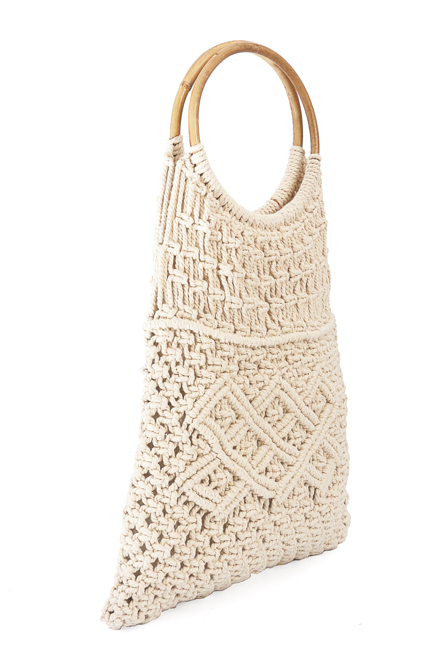 This Macrame Top handle bag is hand-woven by local artisans and makes the perfect everyday accessory. Durable and strong to hold your everyday essentials.