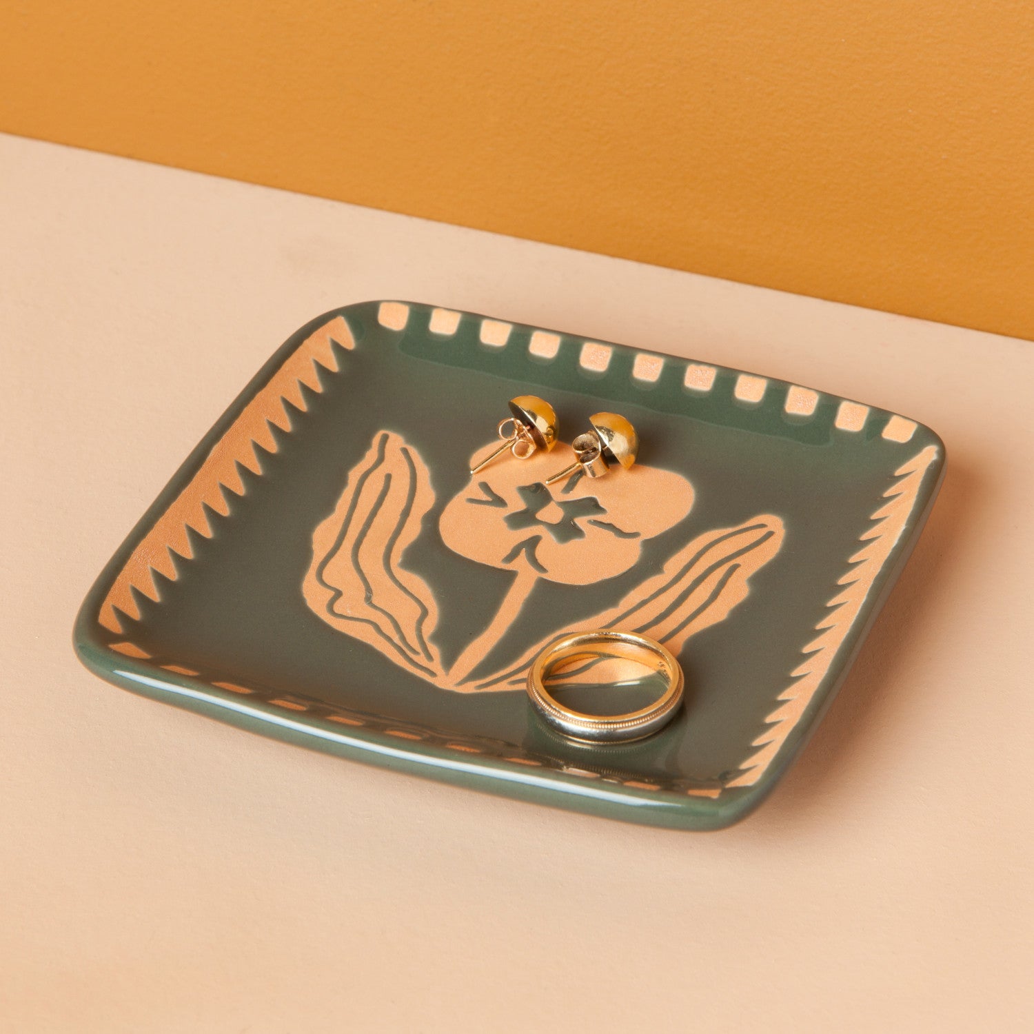 This Teppi imprint trinket tray makes a delightful addition to your desk, dresser or anywhere else you want to collect your trinkets and treasures.