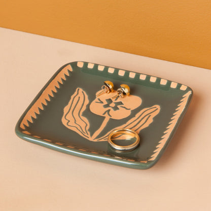 This Teppi imprint trinket tray makes a delightful addition to your desk, dresser or anywhere else you want to collect your trinkets and treasures.