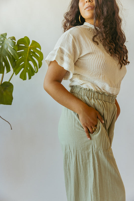 This paperbag waist pant is comfy, roomy, high waisted and wide legged. Wear it seaside with a swimsuit or with your favorite blouse tucked in. Ethically made in India.