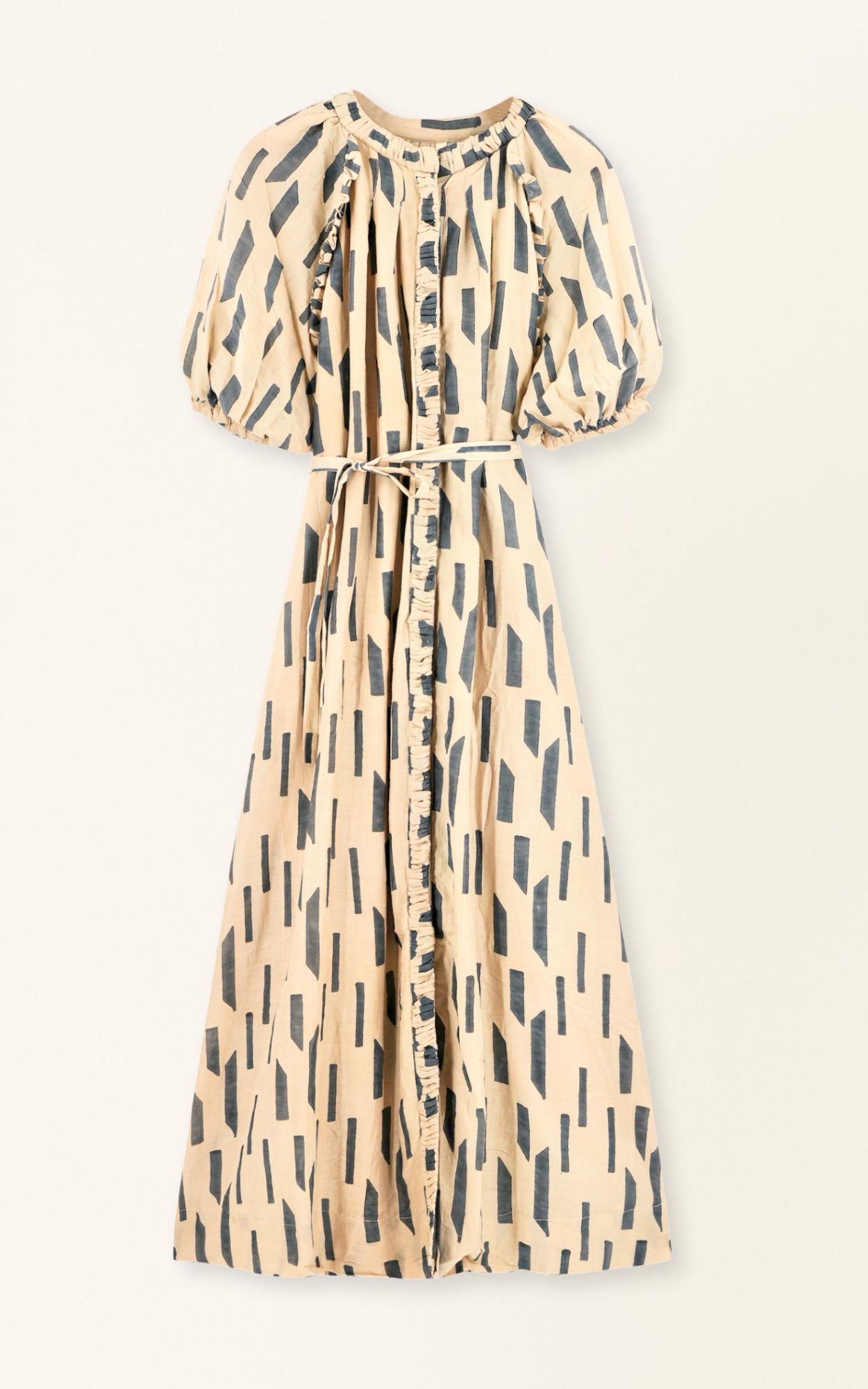 The Somerset Dress is a hand block printed, Midi length dress with high low hem, and raglan sleeves and ruffle detailing.