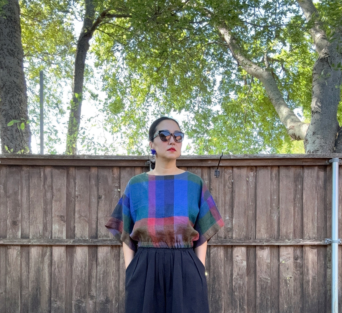 Crafted from 100% high-quality linen, the Blue Check Top offers breathable comfort for warm weather wear. Features a comfortable waist band and relaxed wide sleeves that move with ease.