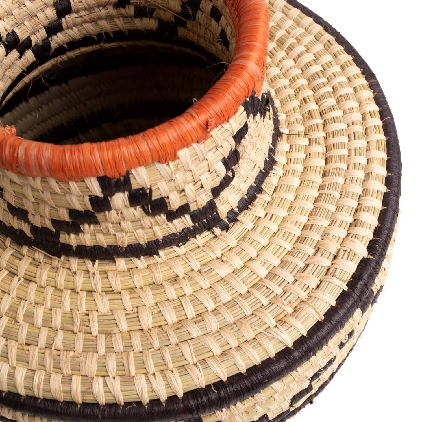 Woven catch all baskets are perfect for just about anything!  Use these stunning home decorations as bathroom storage, organize your bedroom accessories, or use a fruit bowl in the kitchen. Made from all natural fibers of raffia Handmade in Uganda.