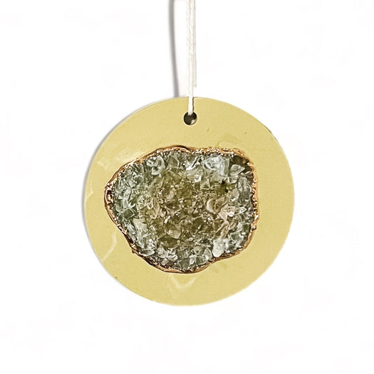 Stunning heirloom ornament whether it’s for your tree or decor for all year. Made from natural green calcite and citrine crystals and outlined in 22k gold leaf.