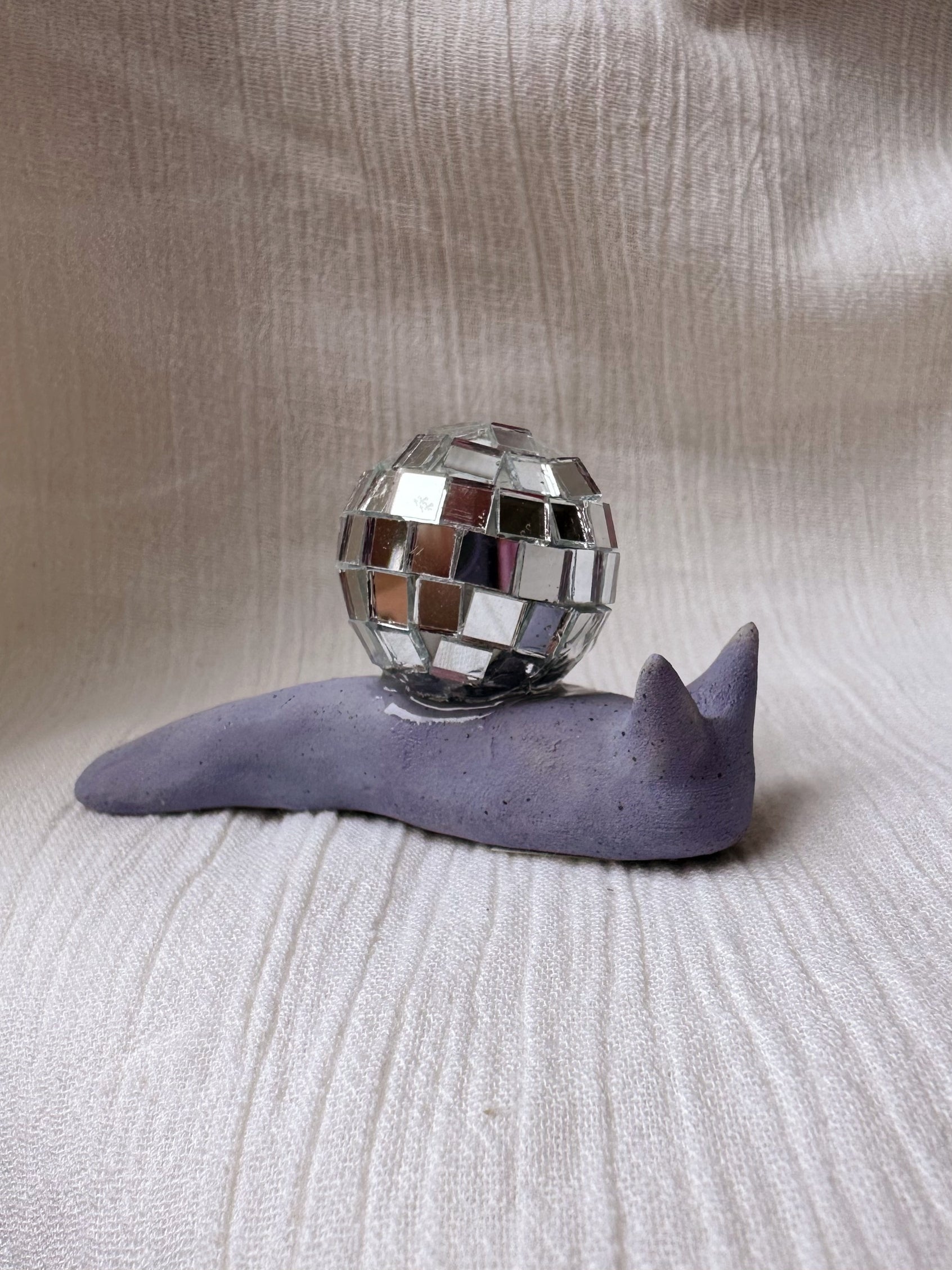 ceramic disco snail decor