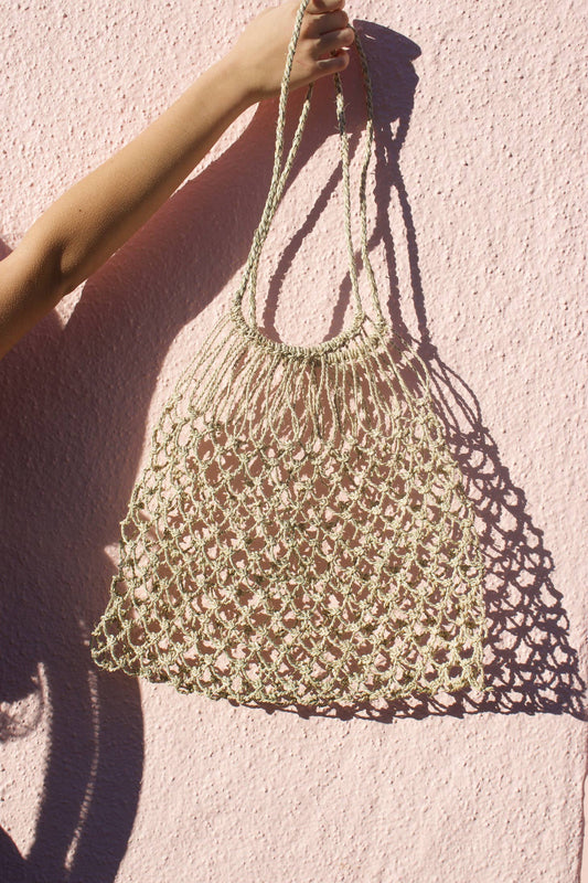 Handwoven from chupon in Patagonia, Chile by two women artisans. We love to use this bag for a day at the beach or a trip to the farmers market, or even as decor in the home.