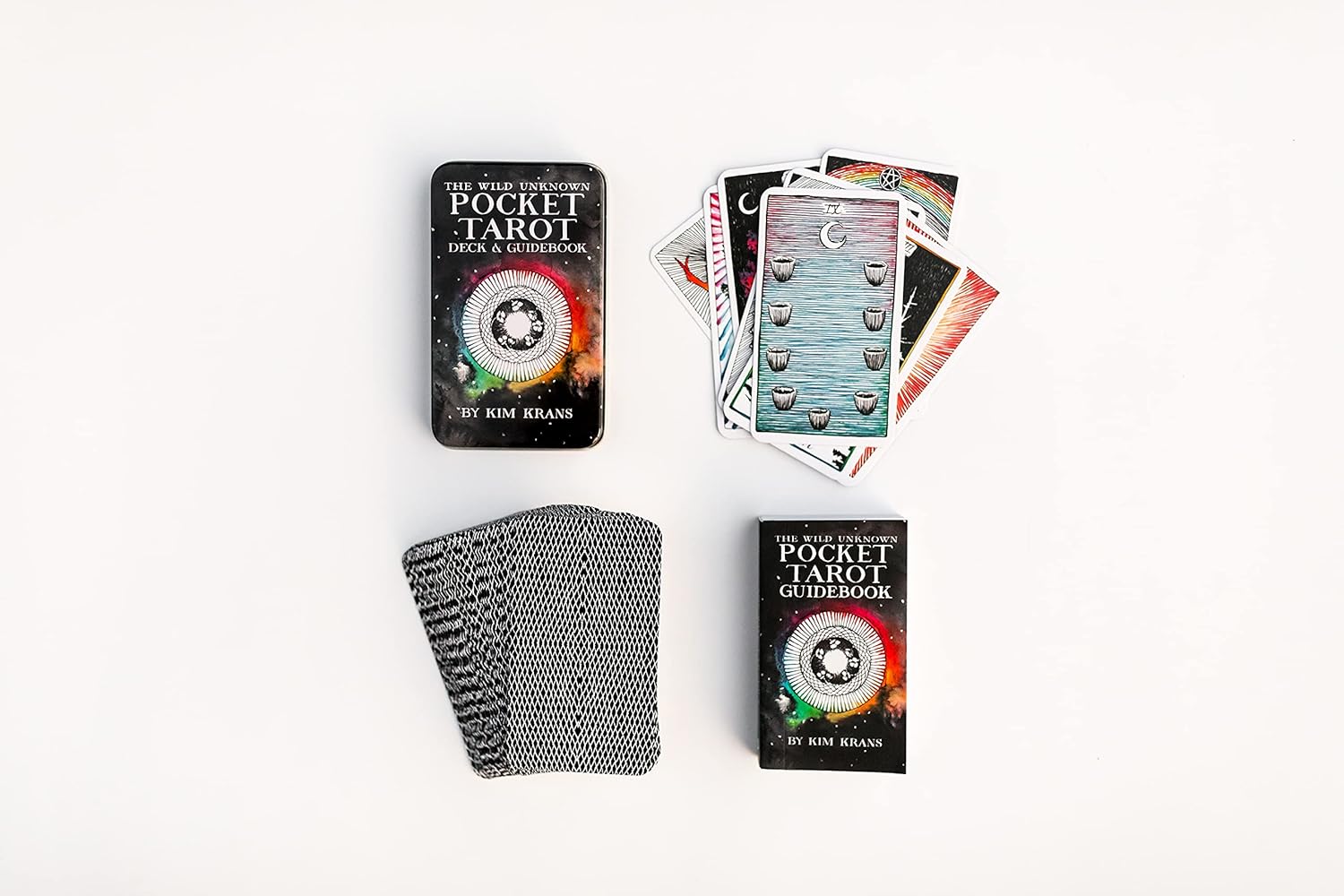 Pocket Tarot cards with a black cloth on a white background. The Wild Unknown Pocket Tarot