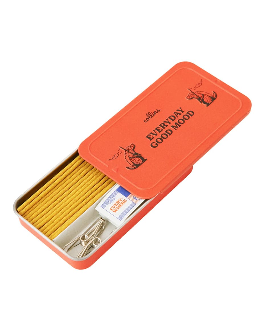 Orange tin box with 'Everyday Good Wood' branding, containing wooden matches and Japanese incense.