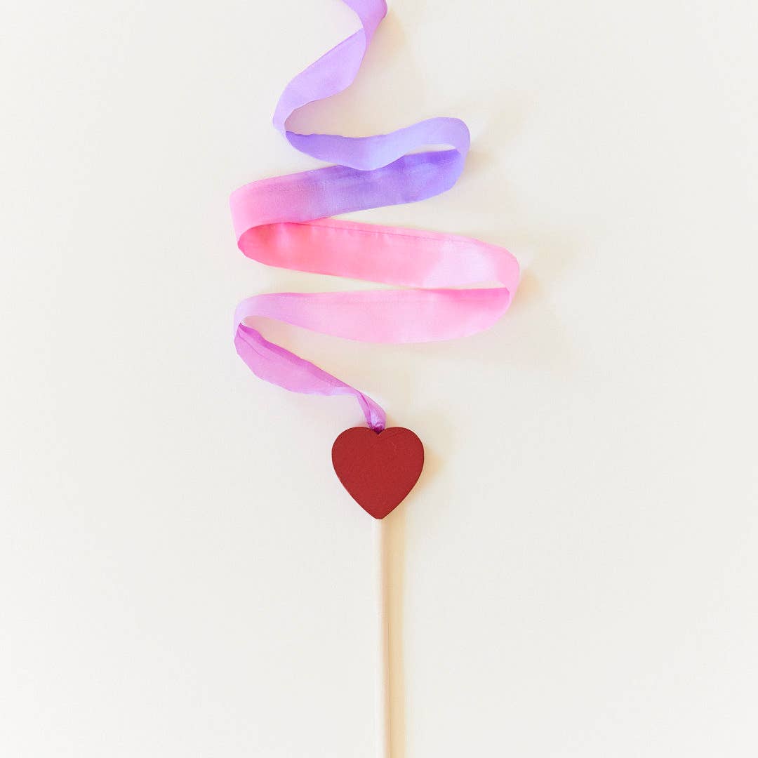 Streamers encourage children to play actively, increase their quality of movement, and make them want to dance! Some pretend play ideas include waving in the wind, writing letters in the air, pretend fishing, dancing, and more. A wooden stick with a strip of pink & purple made from gorgeous, lightweight 100% pure silk.