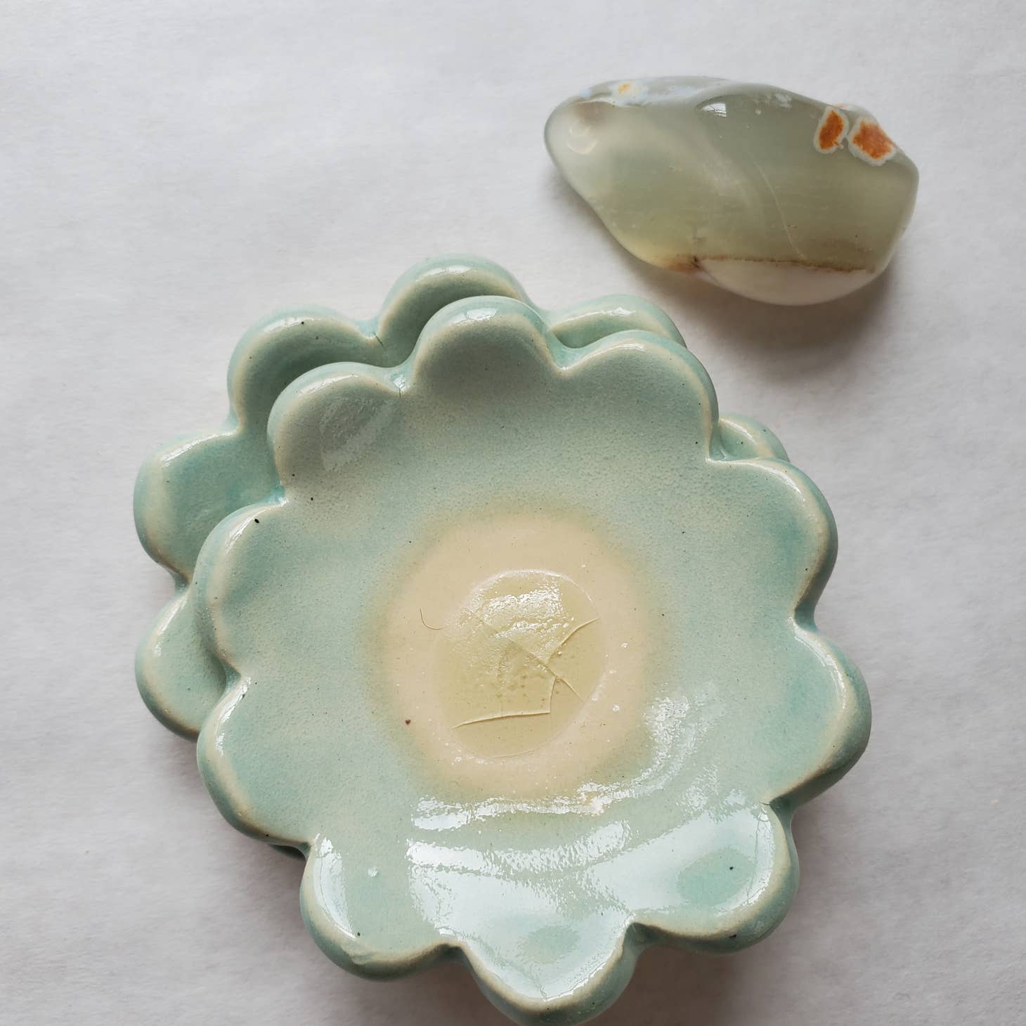 A teeny tiny dish for your rings & other little findings. Some styles feature gold luster accents.  Each one is one of a kind - made with love & enthusiasm by Curious Clay.