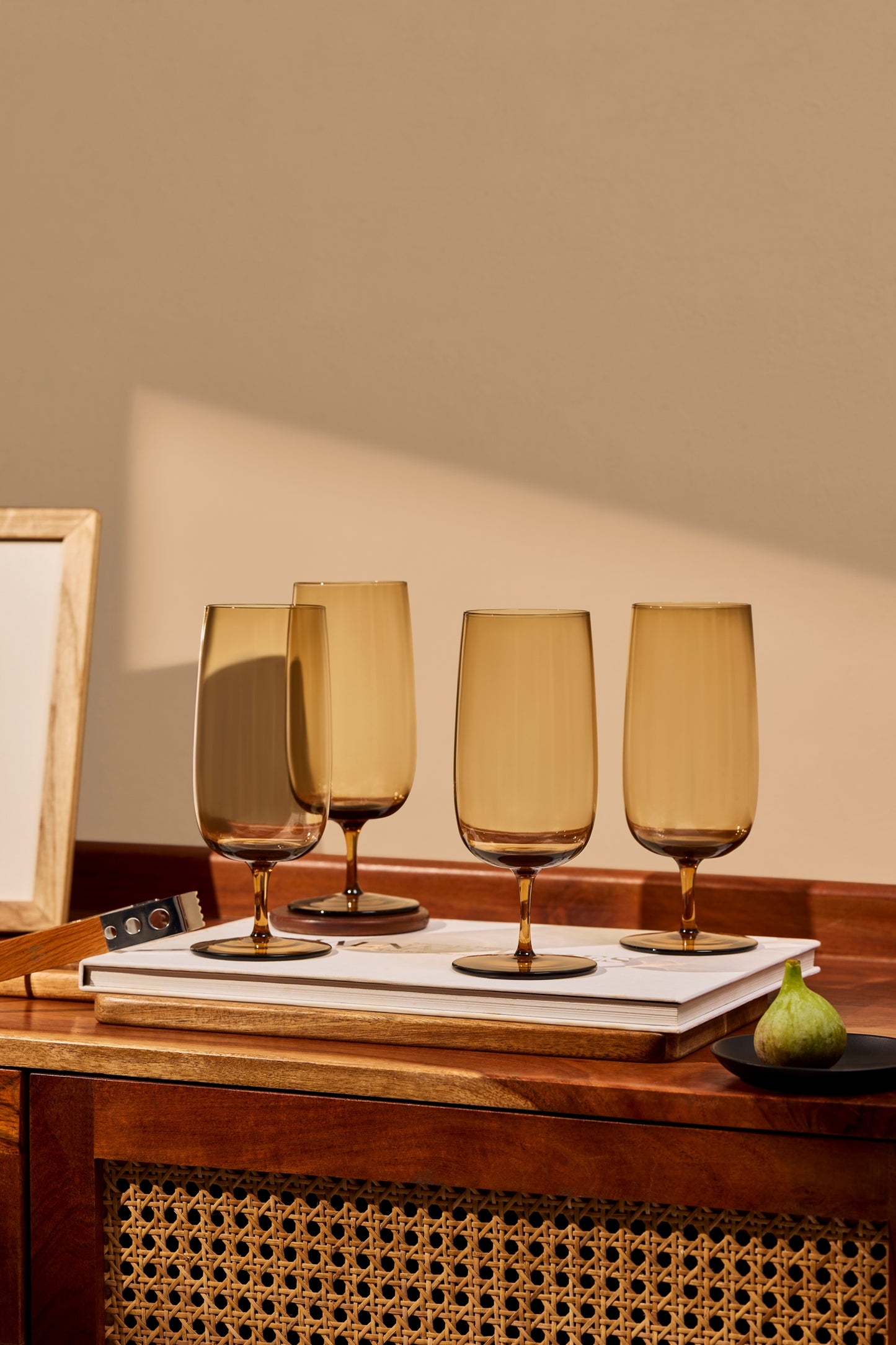 A tall, minimal silhouette in lightweight, solid-colored glass. Perfect for water, iced drinks, or long pours—designed for everyday use.