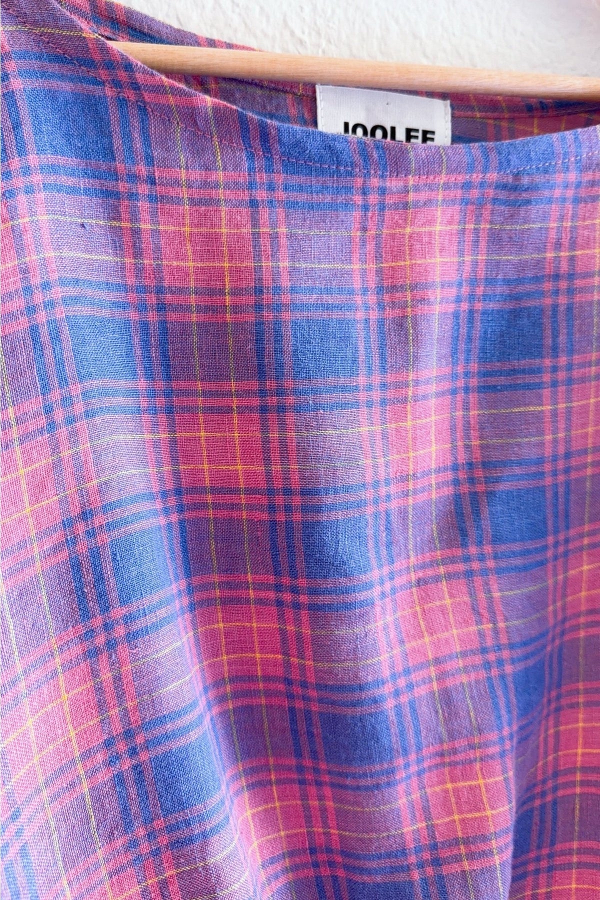 Crafted from 100% high-quality linen, the Lilac Check Top offers breathable comfort for warm weather wear. Features a comfortable waist band and relaxed wide sleeves that move with ease.