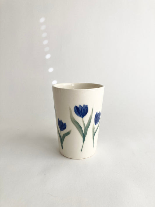 tulips ceramic cup / Slip casted ceramic cups in dover white (off white) and painted with blue tulips. Handmade by Alicja in her Vermont studio.