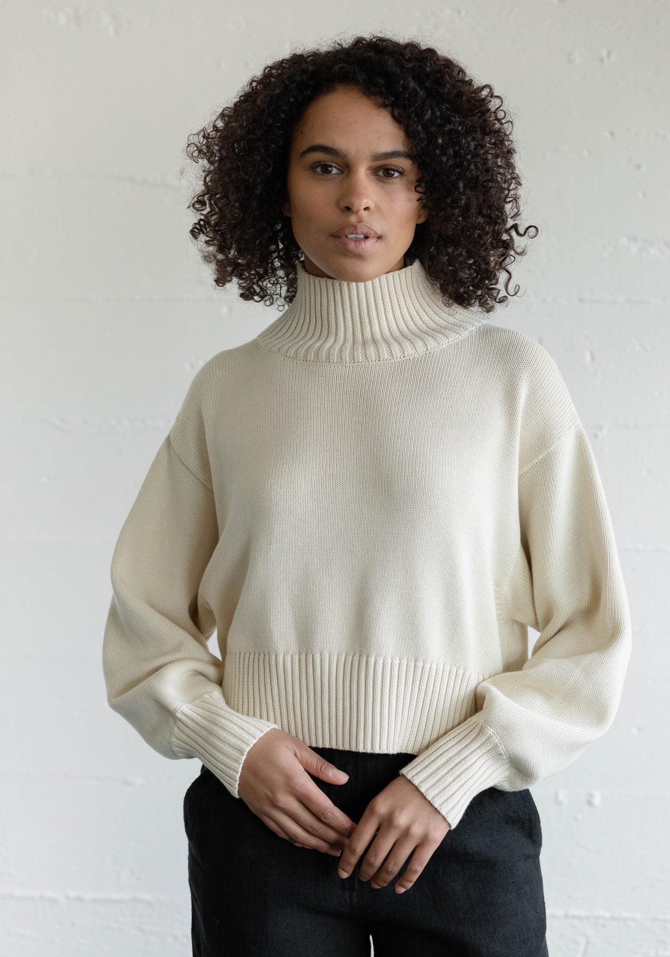 The perfect cropped mid weight cover up or layering piece to style with your favorite high rise bottoms. Made with 100% organic cotton in Peru.