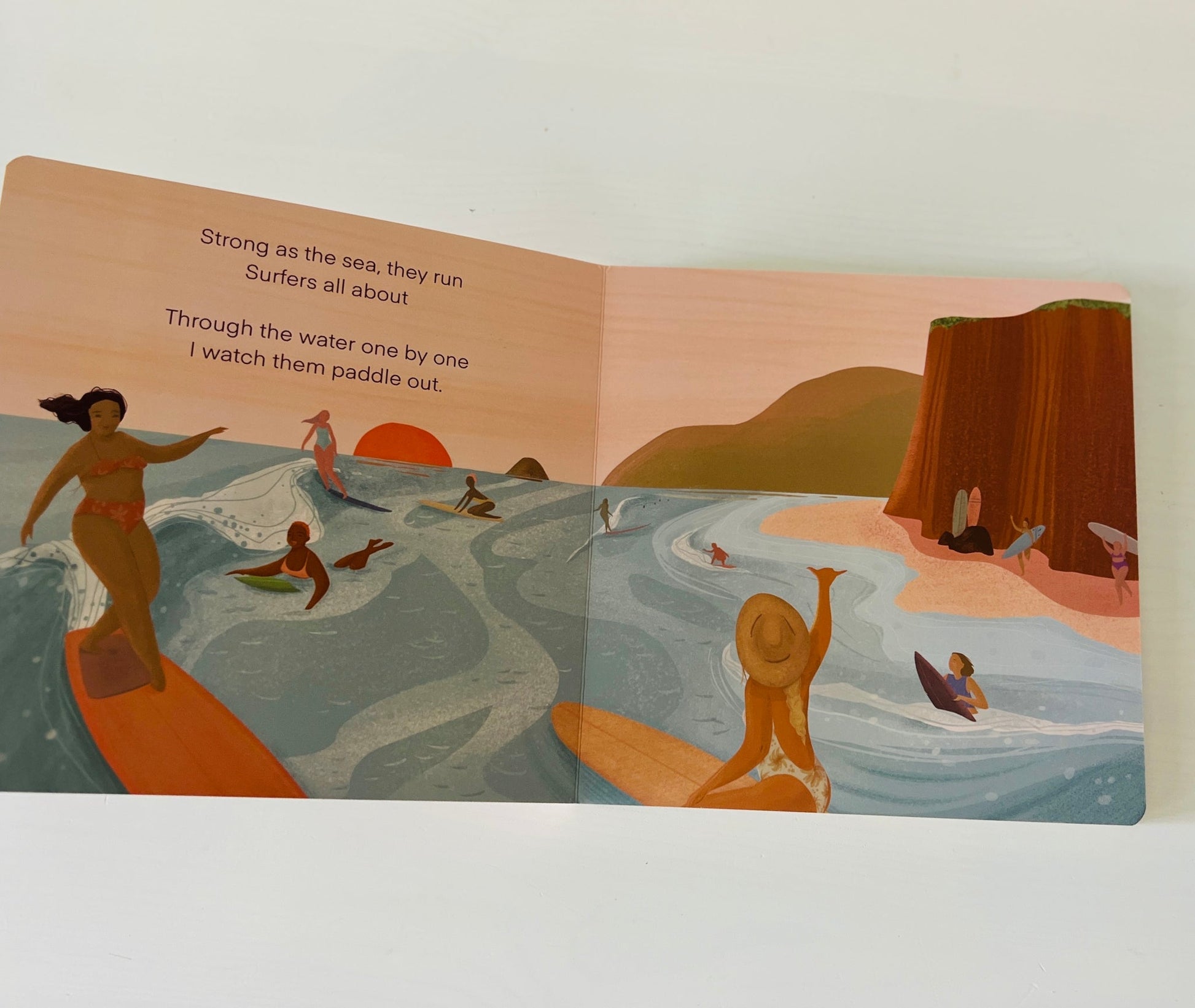 Experience a day at the beach through the eyes of a small child. Observe the friendship and love of sport displayed by everyday female athletes. This 8x8 inch board book was created in Vancouver BC and Encinitas CA.  Perfect gift for beach lovers, new moms, baby showers or the little athlete in your life.