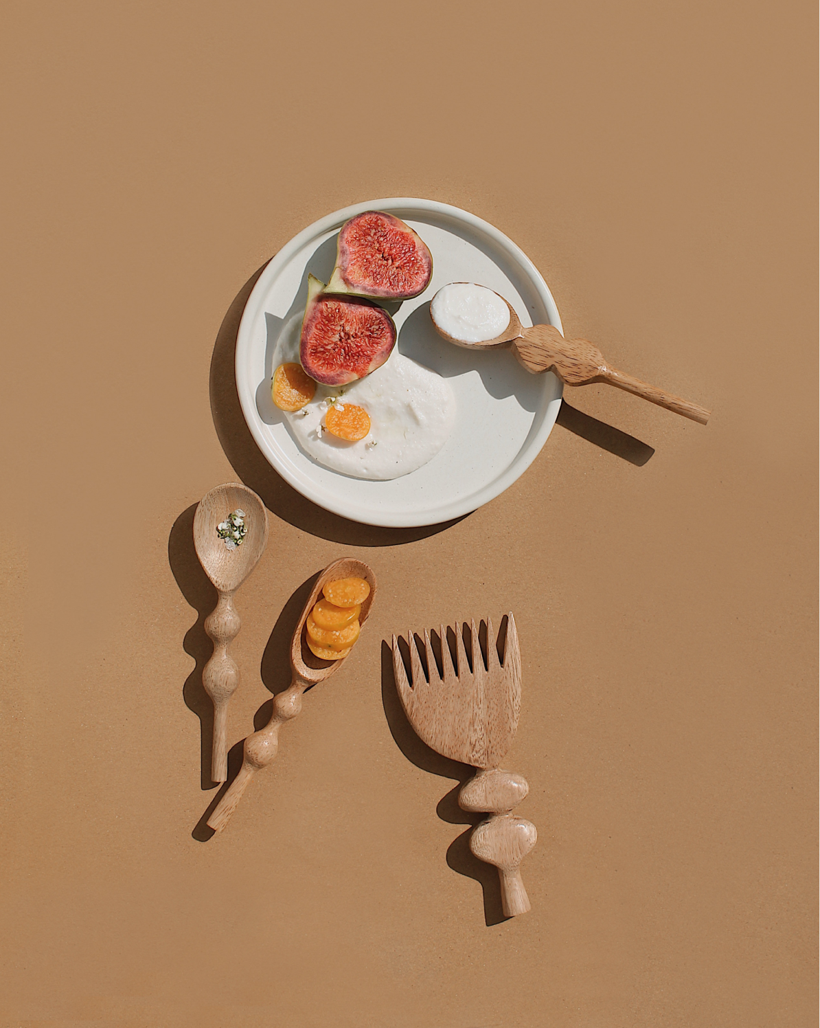 Discover the joy of cooking with these handcrafted wooden spoons! Artisans have infused each piece with love and creativity, featuring groovy handles for a fun and easy grip. Handmade in India.
