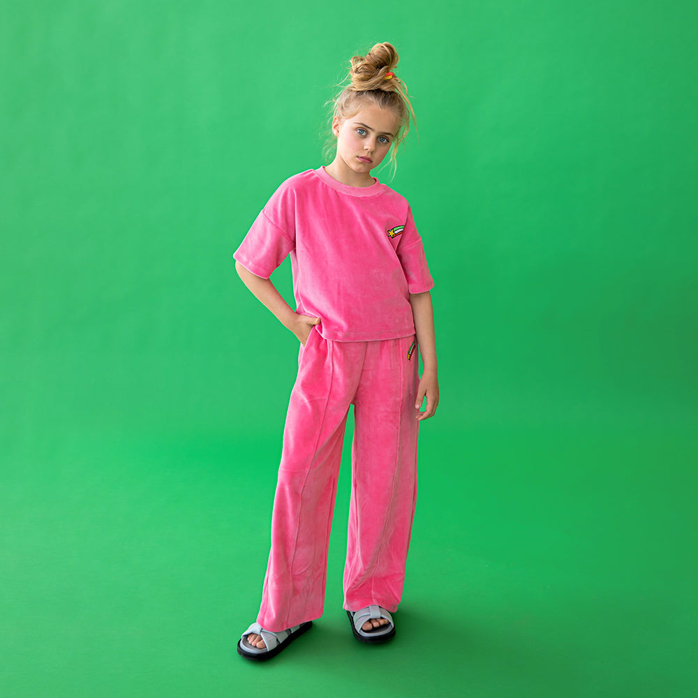 Pink wide leg pant with pockets - features shooting star embroidery.  Ethically produced, colorful and fun with an eye towards comfort, style and joy. Modern and sustainable kids clothing by CarlijnQ of the Netherlands.