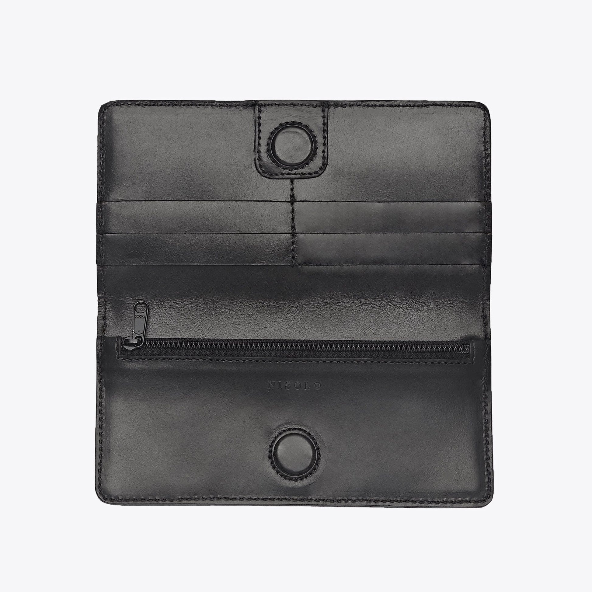 Elevated, structured, and with just enough storage for all that you actually need on hand, it’s time to upgrade and ditch that bulky wallet filled with who knows what. Internal six-card holder, Internal zipper pocket and Magnetic closure. Made sustainably by Nisolo.