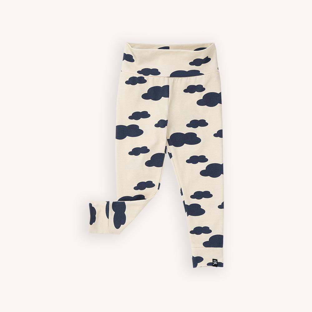 Off white based legging with a navy cloud print made with 95% organic cotton. Ethically produced, colorful and fun with an eye towards comfort, style and joy. Modern and sustainable kids clothing by CarlijnQ of the Netherlands.