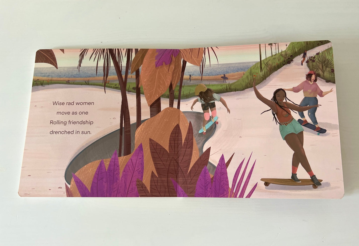 Experience a day at the beach through the eyes of a small child. Observe the friendship and love of sport displayed by everyday female athletes. This 8x8 inch board book was created in Vancouver BC and Encinitas CA.  Perfect gift for beach lovers, new moms, baby showers or the little athlete in your life.