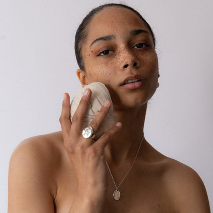 Crafted meticulously in shimmering bronze or sterling silver, with a watery finish, this ring makes a bold statement, both in weight and appearance, inviting wearers to embrace their inner strength and intuition. Handmade in Santa Cruz by Amanda Hunt.