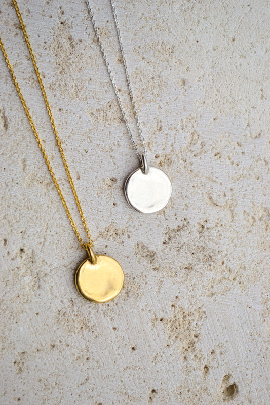 A classic everyday medallion necklace. Simple and feminine with a fluid feel. Inspired by the artist Georgia O'Keeffe. Georgia Necklace by Amanda Hunt