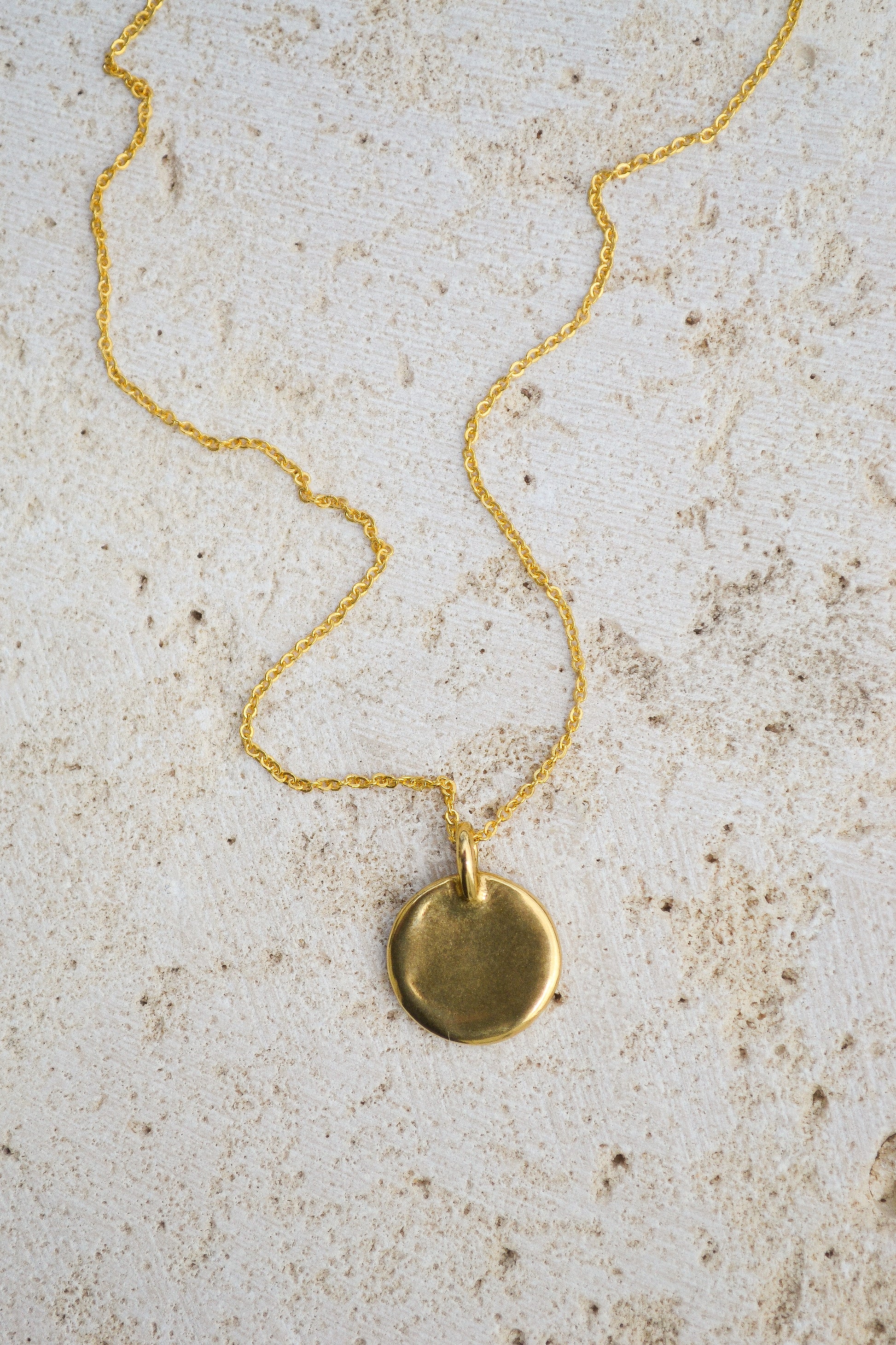 A classic everyday medallion necklace. Simple and feminine with a fluid feel. Inspired by the artist Georgia O'Keeffe. Georgia Necklace by Amanda Hunt